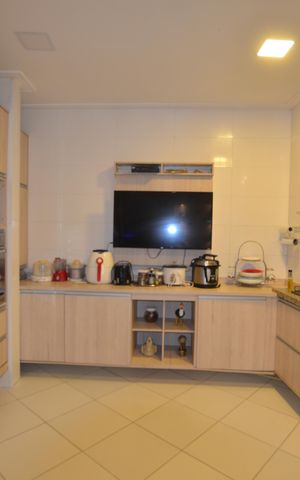 Casa à venda com 154m², 3 quartos e 2 vagasCozinha e Área de Serviço