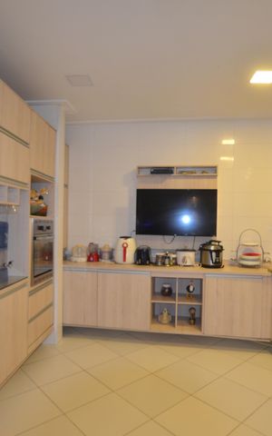 Casa à venda com 154m², 3 quartos e 2 vagasCozinha e Área de Serviço