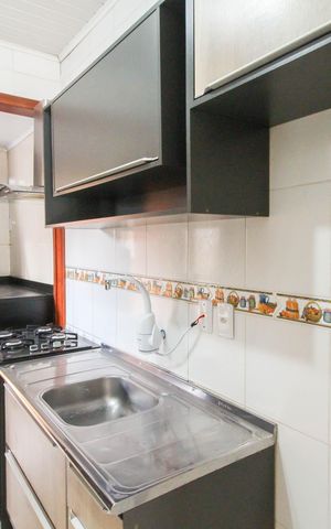 Casa à venda com 85m², 3 quartos e 2 vagas Casa à venda com 85m², 3 quartos e 2 vagasCozinha