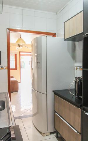 Casa à venda com 85m², 3 quartos e 2 vagas Casa à venda com 85m², 3 quartos e 2 vagasCozinha