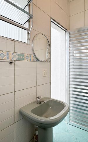 Casa à venda com 114m², 2 quartos e 2 vagas Casa à venda com 114m², 2 quartos e 2 vagasBanheiro de serviço