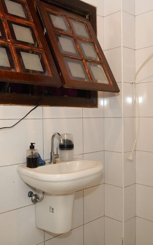 Casa à venda com 208m², 2 quartos e 5 vagasBanheiro 4 - Área externa
