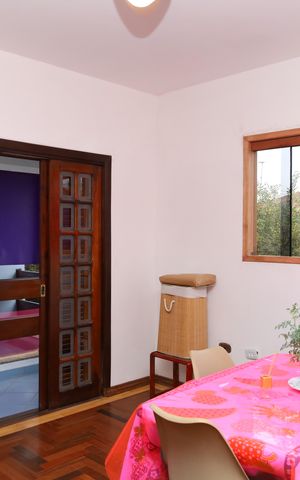 Casa à venda com 208m², 2 quartos e 5 vagasSuíte 2