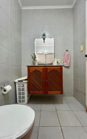 Casa à venda com 217m², 4 quartos e 5 vagasBanheiro