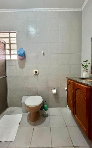Casa à venda com 217m², 4 quartos e 5 vagasBanheiro