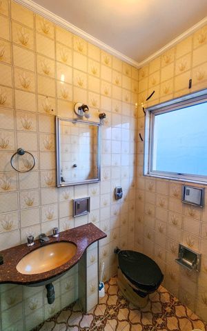 Casa à venda com 206m², 4 quartos e 1 vagaBanheiro 