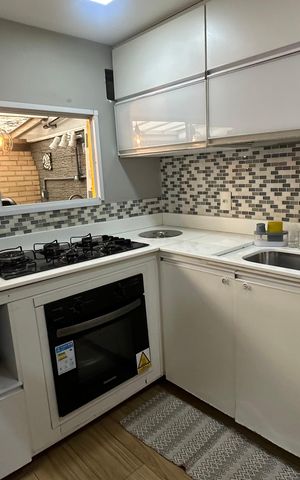 Casa de condomínio à venda com 85m², 3 quartos e 2 vagas Casa de condomínio à venda com 85m², 3 quartos e 2 vagasCozinha