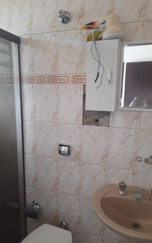 Casa à venda com 119m², 3 quartos e 2 vagas Casa à venda com 119m², 3 quartos e 2 vagasBanheiro