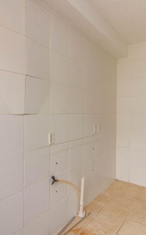 Apartamento à venda com 50m², 2 quartos e 1 vaga Apartamento à venda com 50m², 2 quartos e 1 vagaCozinha e Área de Serviço