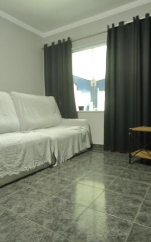 Casa à venda com 106m², 3 quartos e 3 vagasSala