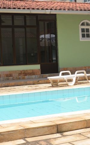 Casa de condomínio à venda com 200m², 4 quartos e 4 vagas Casa de condomínio à venda com 200m², 4 quartos e 4 vagasÁrea Externa