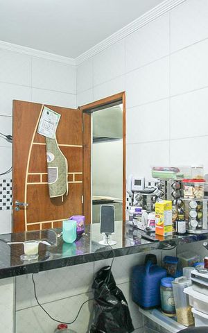 Casa à venda com 180m², 2 quartos e 2 vagas Casa à venda com 180m², 2 quartos e 2 vagasCozinha