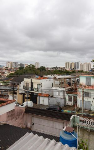 Casa à venda com 154m², 5 quartos e 1 vagaÁrea de Serviço - vista