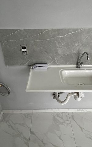 Apartamento à venda com 32m², 2 quartos e sem vaga Apartamento à venda com 32m², 2 quartos e sem vagaCozinha e Área de Serviço