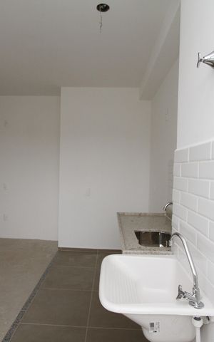Apartamento à venda com 54m², 2 quartos e 1 vagaCozinha e Área de Serviço