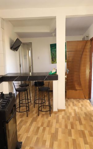 Casa de condomínio para alugar com 65m², 2 quartos e 1 vagaSala/Cozinha