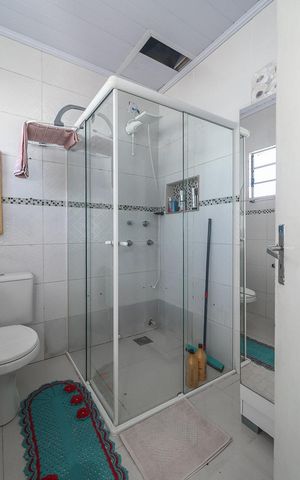 Casa à venda com 102m², 4 quartos e sem vagaBanheiro da Suíte