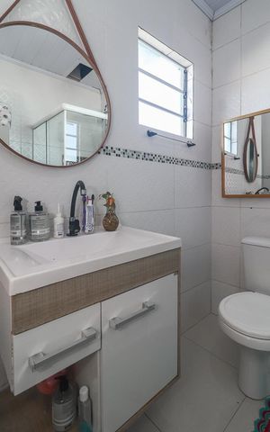 Casa à venda com 102m², 4 quartos e sem vagaBanheiro da Suíte