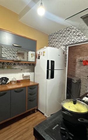 Casa à venda com 110m², 3 quartos e 2 vagas Casa à venda com 110m², 3 quartos e 2 vagasCozinha
