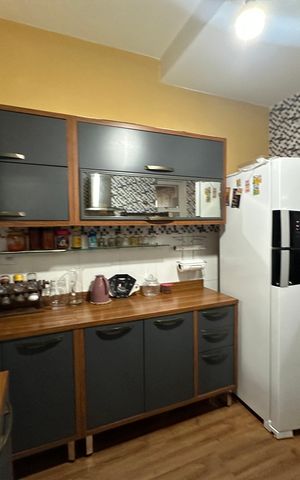 Casa à venda com 110m², 3 quartos e 2 vagas Casa à venda com 110m², 3 quartos e 2 vagasCozinha