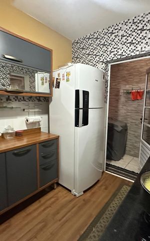 Casa à venda com 110m², 3 quartos e 2 vagas Casa à venda com 110m², 3 quartos e 2 vagasCozinha