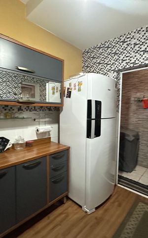Casa à venda com 110m², 3 quartos e 2 vagas Casa à venda com 110m², 3 quartos e 2 vagasCozinha