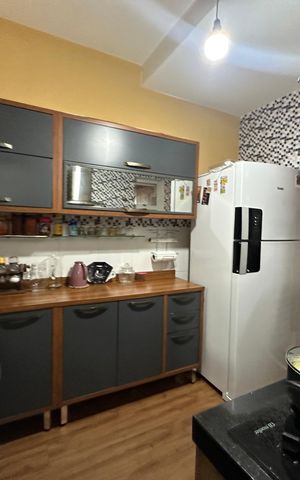Casa à venda com 110m², 3 quartos e 2 vagas Casa à venda com 110m², 3 quartos e 2 vagasCozinha