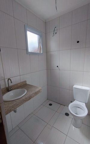 Casa de condomínio à venda com 94m², 3 quartos e 2 vagasBanheiro