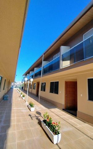 Casa de condomínio à venda com 94m², 3 quartos e 2 vagasÁrea externa