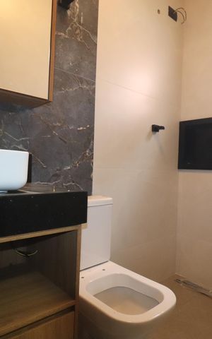 Casa à venda com 210m², 3 quartos e 3 vagasBanheiro Quarto 1 suíte