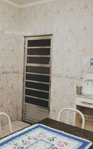 Casa à venda com 132m², 3 quartos e 3 vagas Casa à venda com 132m², 3 quartos e 3 vagasCozinha