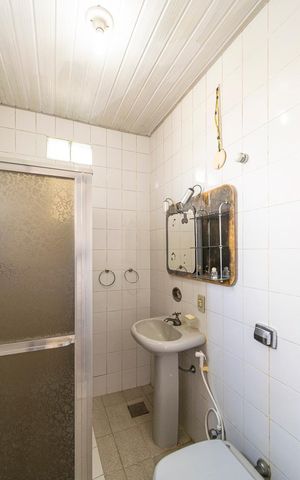 Casa à venda com 316m², 3 quartos e 2 vagas Casa à venda com 316m², 3 quartos e 2 vagasBanheiro da Suíte