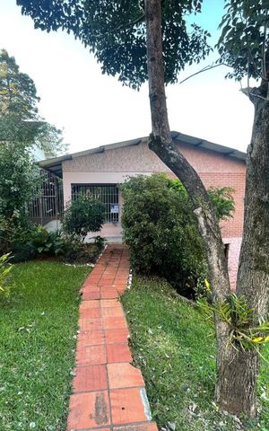 Casa à venda com 136m², 3 quartos e 2 vagas Casa à venda com 136m², 3 quartos e 2 vagasFachada