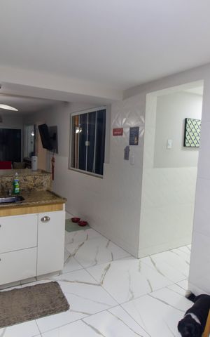 Casa à venda com 200m², 3 quartos e 1 vaga Casa à venda com 200m², 3 quartos e 1 vagaCozinha e Área de Serviço