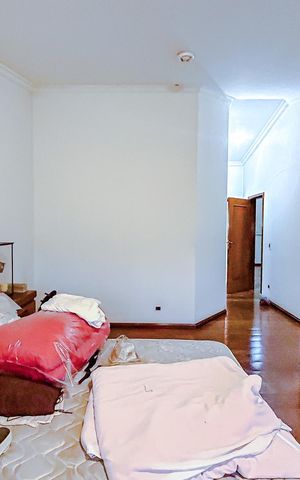 Casa à venda com 670m², 5 quartos e 6 vagasQuarto 1 - Suíte