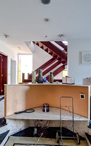 Casa à venda com 670m², 5 quartos e 6 vagasSala