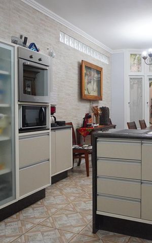 Casa à venda com 200m², 4 quartos e 2 vagas Casa à venda com 200m², 4 quartos e 2 vagasCozinha