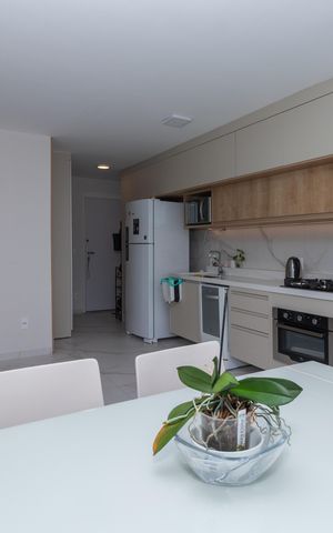 Apartamento à venda com 54m², 2 quartos e 1 vaga Apartamento à venda com 54m², 2 quartos e 1 vagaCozinha e Área de Serviço