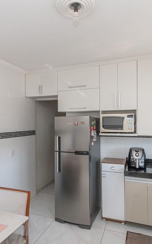 Casa à venda com 125m², 3 quartos e 3 vagas Casa à venda com 125m², 3 quartos e 3 vagasCozinha