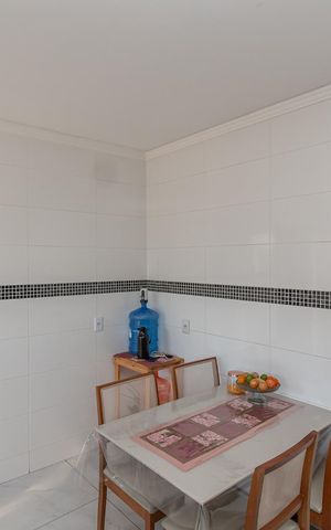 Casa à venda com 125m², 3 quartos e 3 vagas Casa à venda com 125m², 3 quartos e 3 vagasCozinha