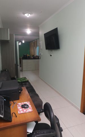 Casa à venda com 116m², 3 quartos e 2 vagasSala de TV
