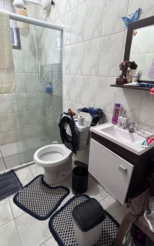 Casa de condomínio à venda com 290m², 3 quartos e 1 vaga Casa de condomínio à venda com 290m², 3 quartos e 1 vagaBanheiro do Quarto 1