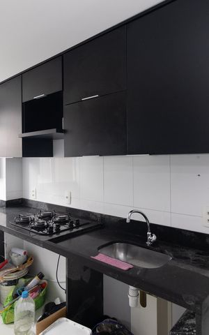 Apartamento à venda com 40m², 2 quartos e 1 vaga Apartamento à venda com 40m², 2 quartos e 1 vagaCozinha e Área de Serviço