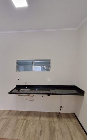 Casa à venda com 240m², 2 quartos e 4 vagas Casa à venda com 240m², 2 quartos e 4 vagasCozinha