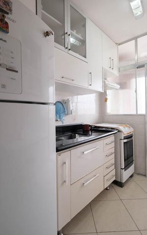 Apartamento à venda com 60m², 2 quartos e 1 vagaCozinha e Área de Serviço