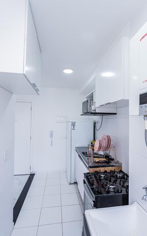 Apartamento à venda com 45m², 2 quartos e 1 vaga Apartamento à venda com 45m², 2 quartos e 1 vagaCozinha e Área de Serviço