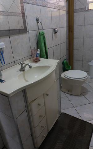 Casa à venda com 261m², 3 quartos e 2 vagasBanheiro