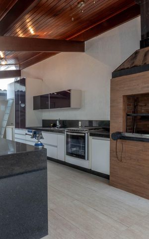 Casa à venda com 410m², 4 quartos e 4 vagas Casa à venda com 410m², 4 quartos e 4 vagasEspaço Gourmet