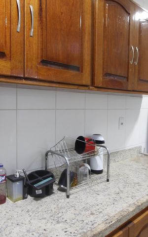 Casa de condomínio para alugar com 220m², 4 quartos e 2 vagasCozinha