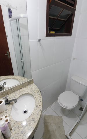Casa de condomínio para alugar com 220m², 4 quartos e 2 vagasBanheiro da Suíte 1